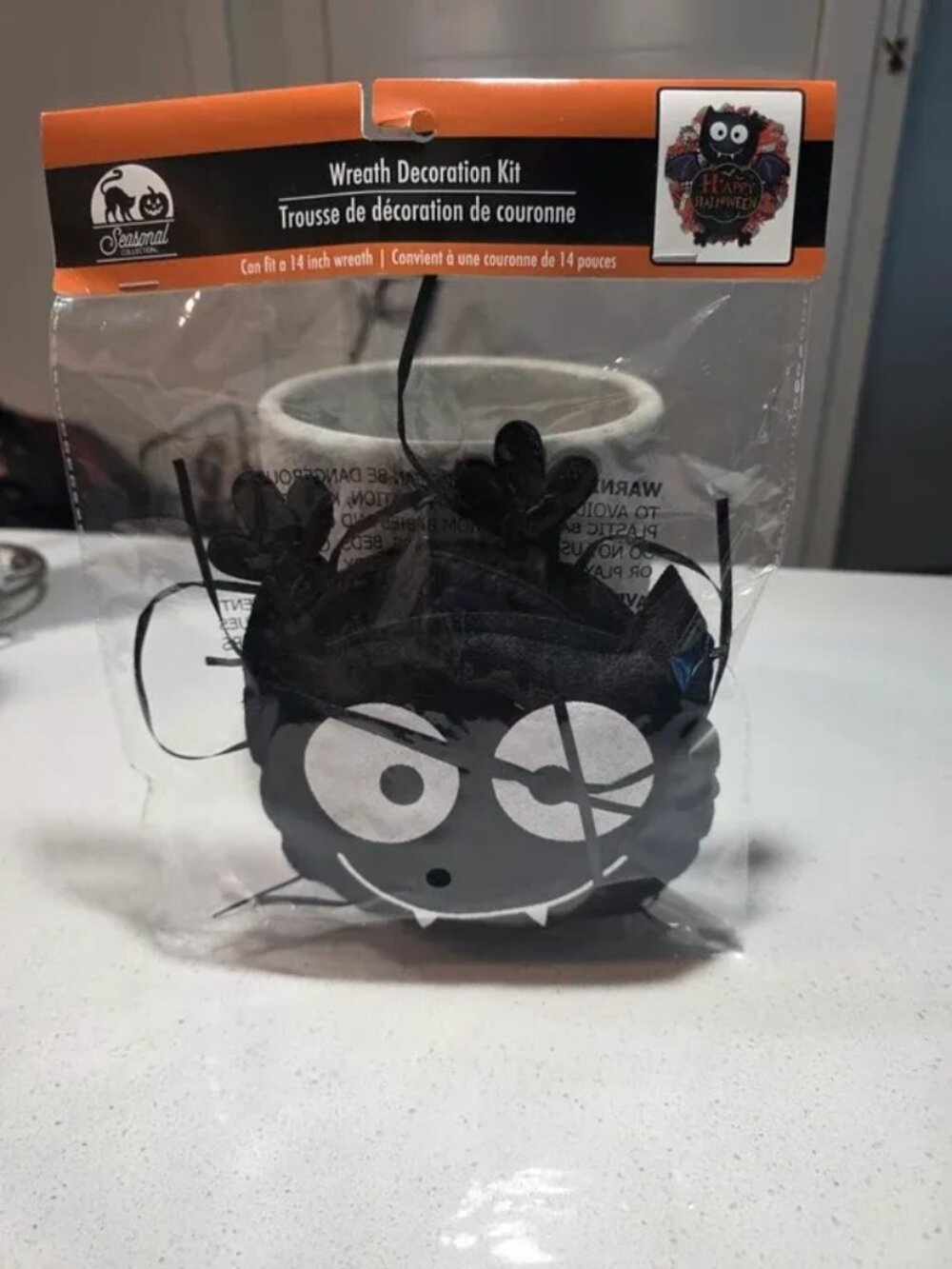 decoration kit, bat design with black fuzzy material and gray felt face